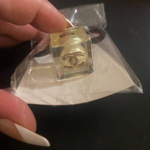 Chanel Clear Cube hair tie.